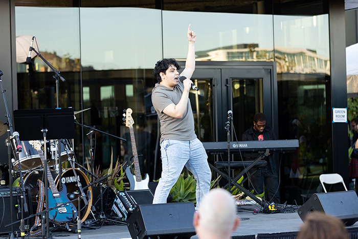 Felipe “Phil” Juarez, a 25-year-old singer from Hollywood singing on stage